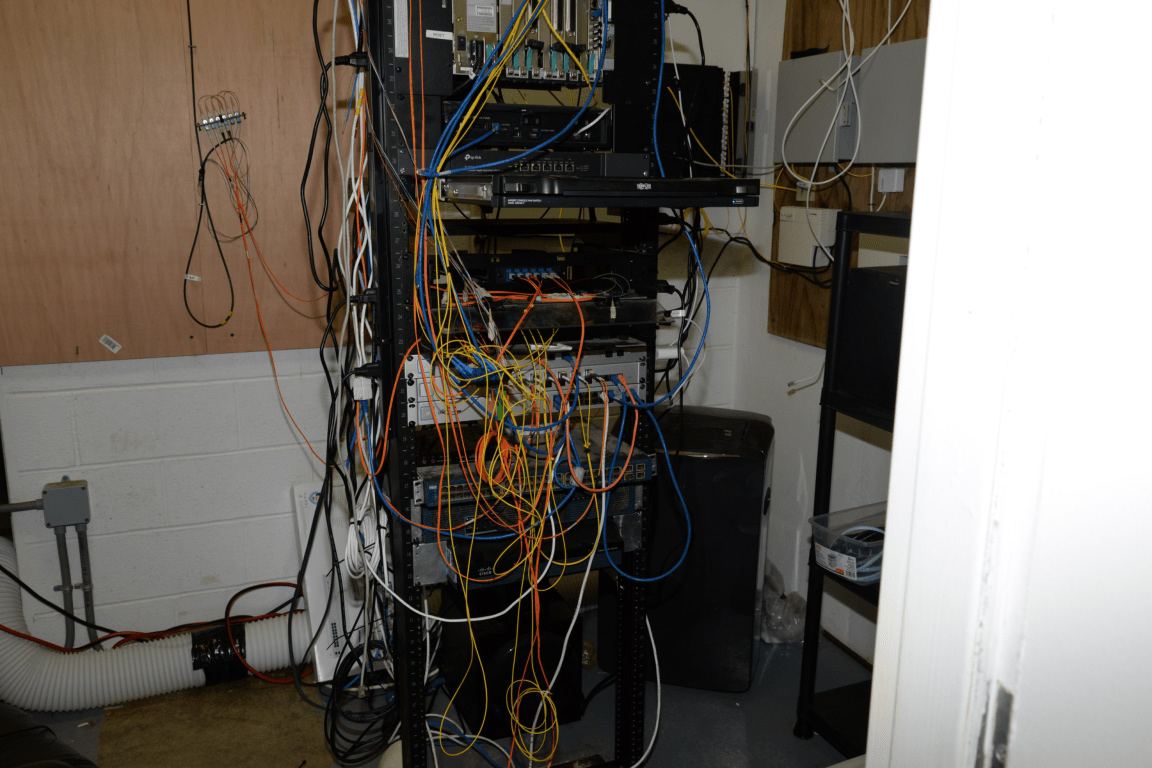 rows of network cables in a mining server room
